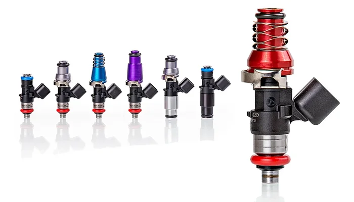 Injector Dynamics ID1050X Injectors – 48mm Length – Mach Top to 11mm – Denso Low Cushion Set of 4 (1050.48.11.D.4)